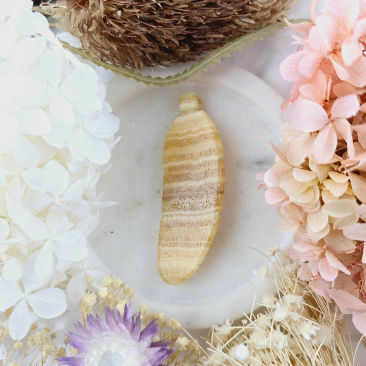 Orange Banded Calcite Feather Pendant