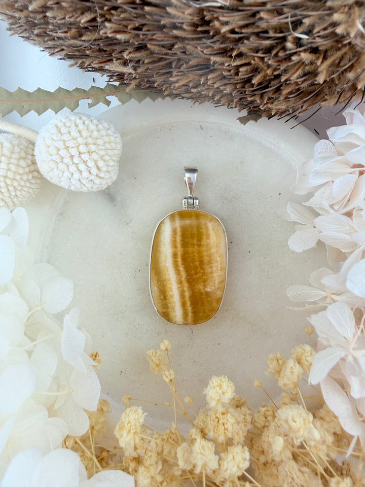 Orange Calcite Silver Pendant