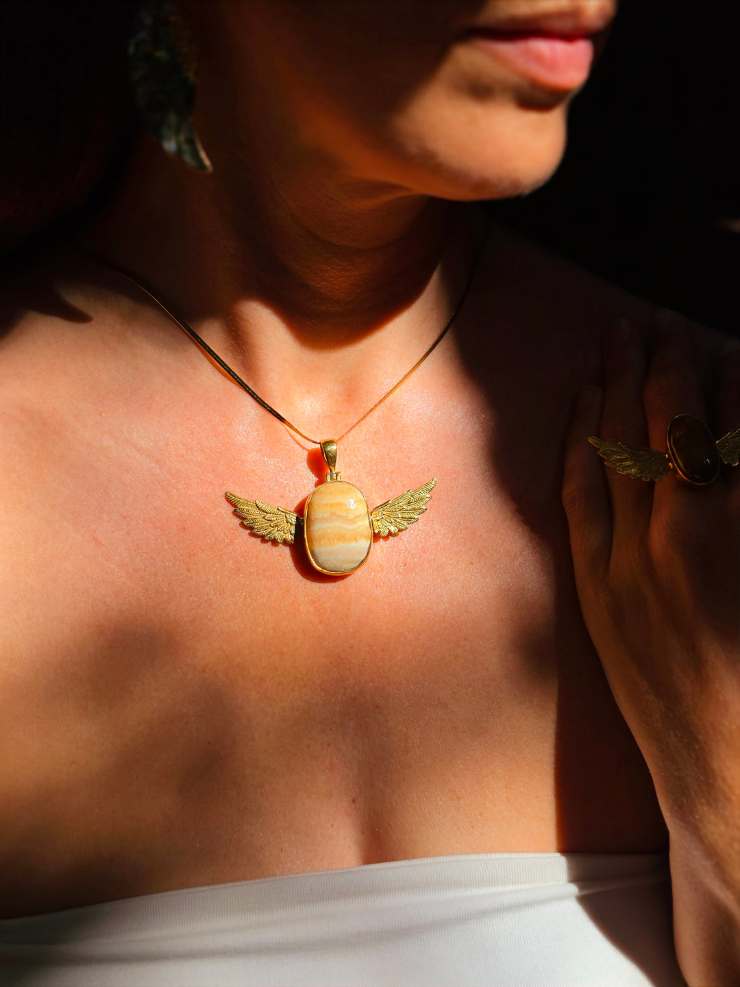 Orange Calcite Anahata Brass Pendant