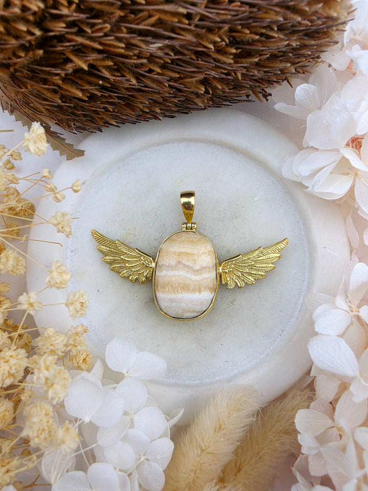 Orange Calcite Anahata Brass Pendant