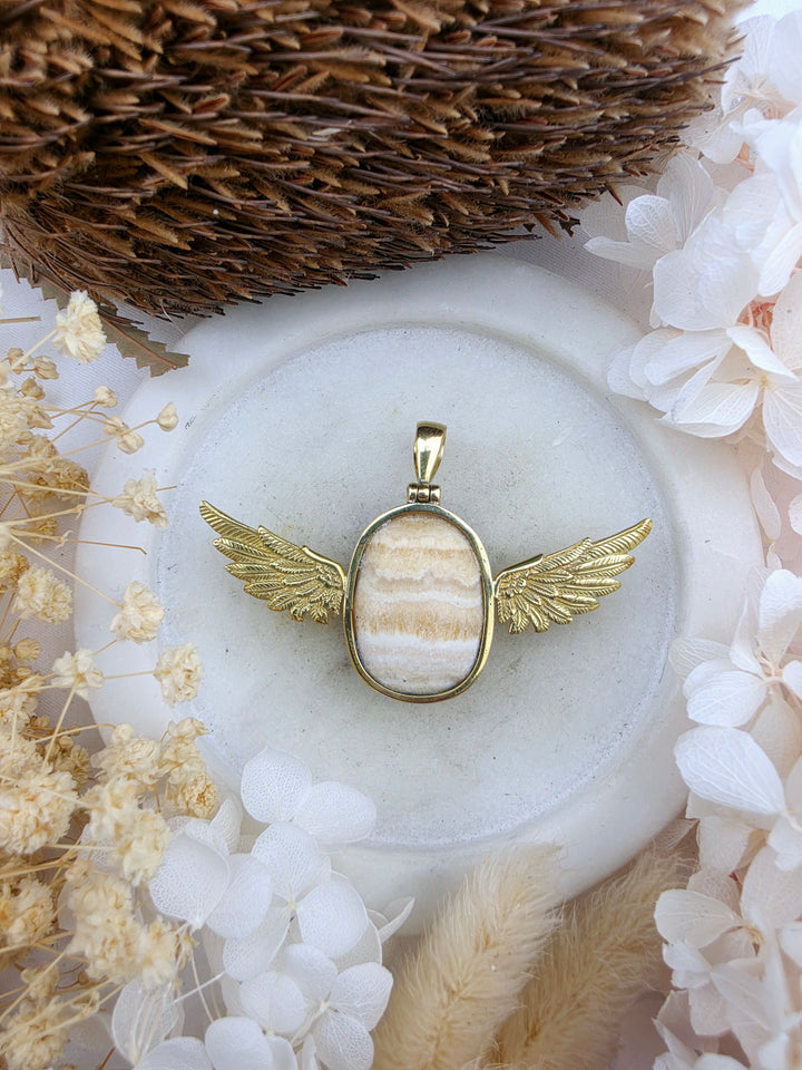 Orange Calcite Anahata Brass Pendant