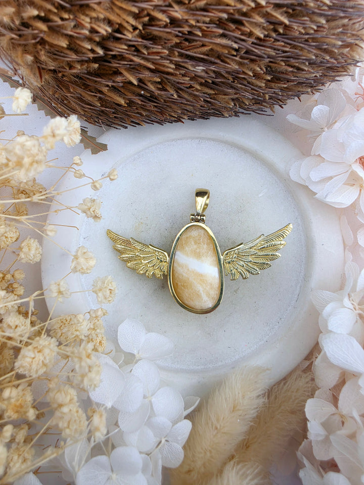 Orange Calcite Anahata Brass Pendant