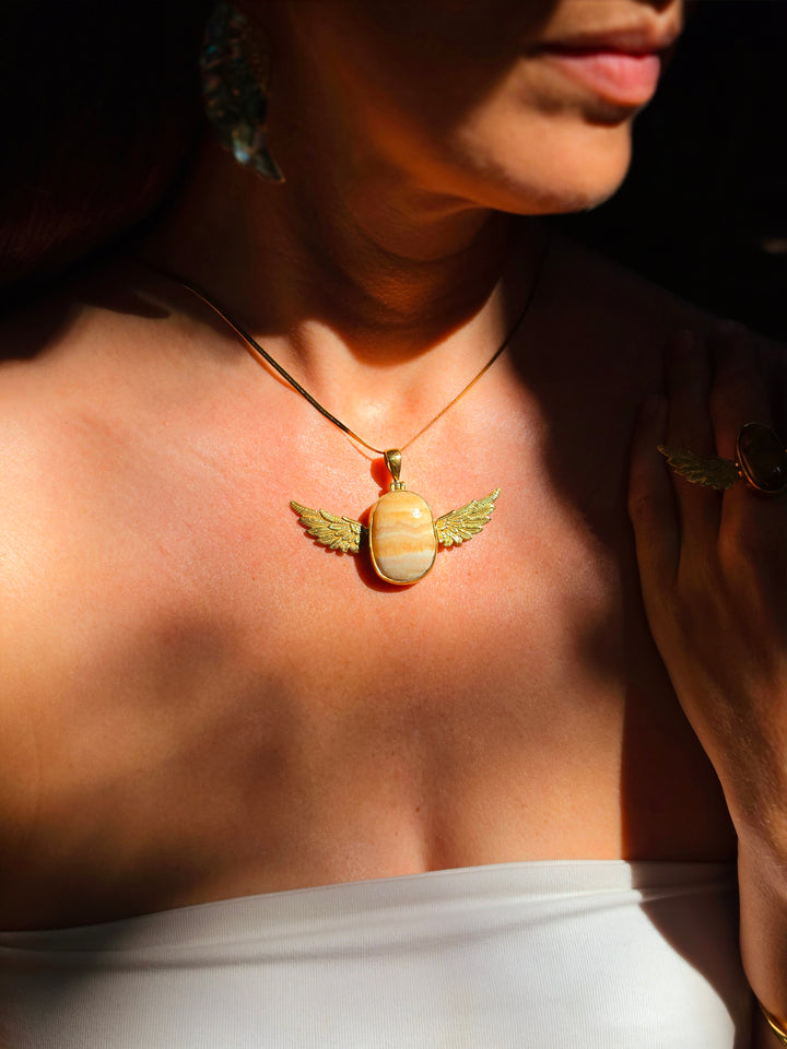 Orange Calcite Anahata Brass Pendant