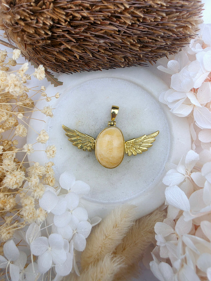 Orange Calcite Anahata Brass Pendant