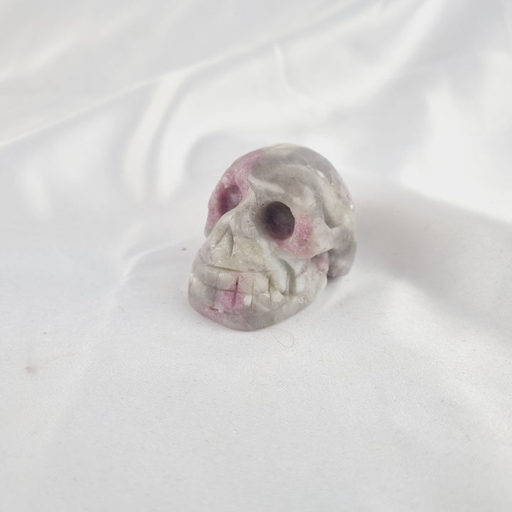 Pink Tourmaline in Quartz Skull
